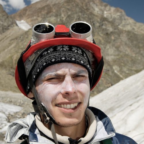 Young mountaineer during heavy workout